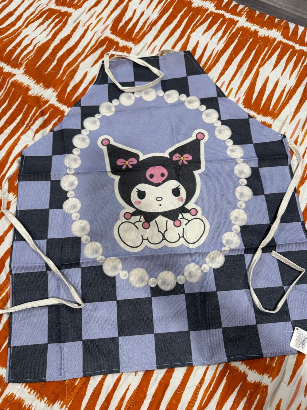 Sanrio Kuromi black and purple checkered apron with pearl necklace graphic